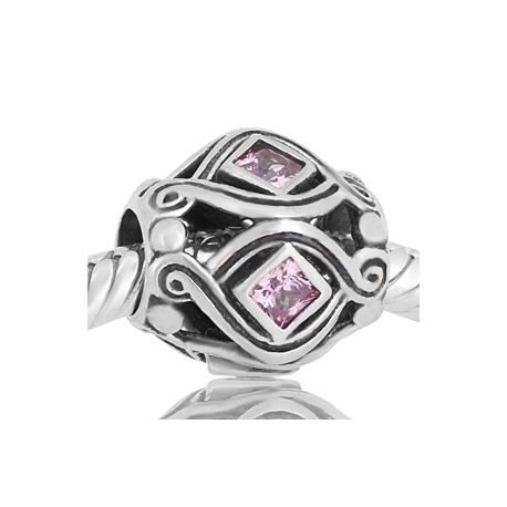 Abalorio con piedras rosas